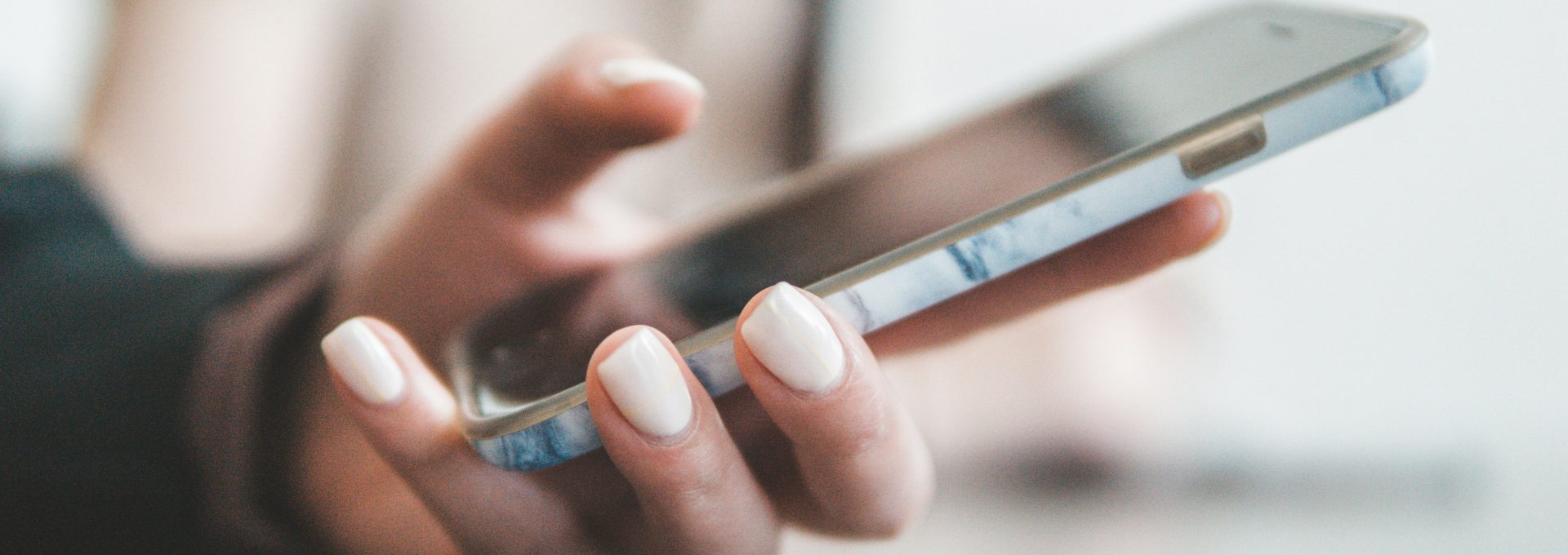 person holding black smartphone